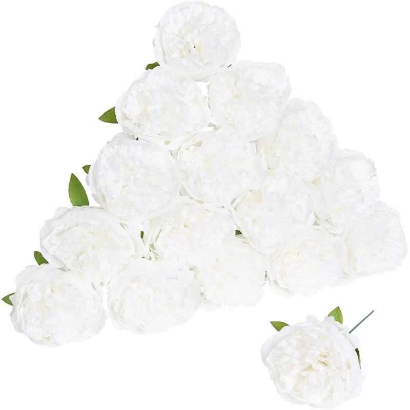 A cluster of white silk peony artificial flowers with stems.