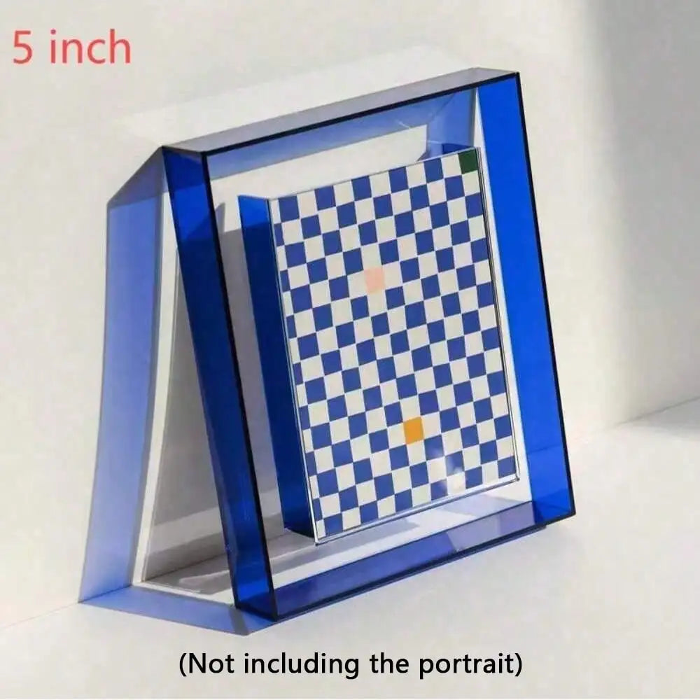 A clear acrylic photo frame displaying a blue and white checkered grid with an orange accent.