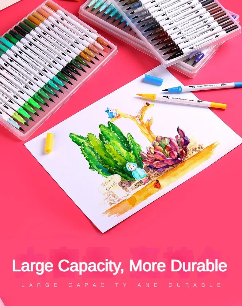 A set of dual-ended watercolor art markers in various colors laid out on a pink surface.
