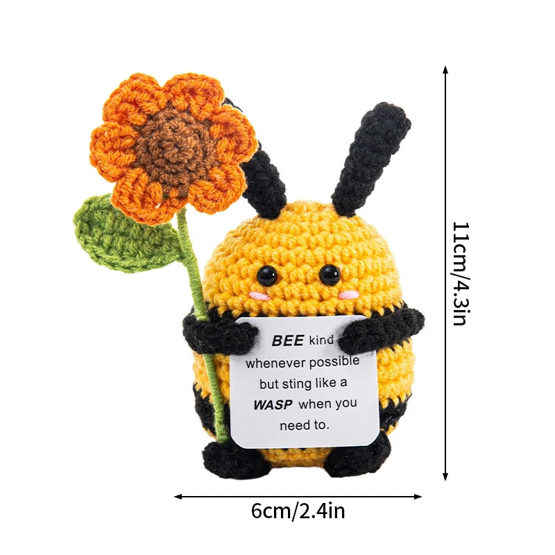 Handmade crochet bee doll with an inspirational slogan pocket for a hug gift