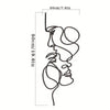 Line drawing of a minimalist abstract face design on metal wall art