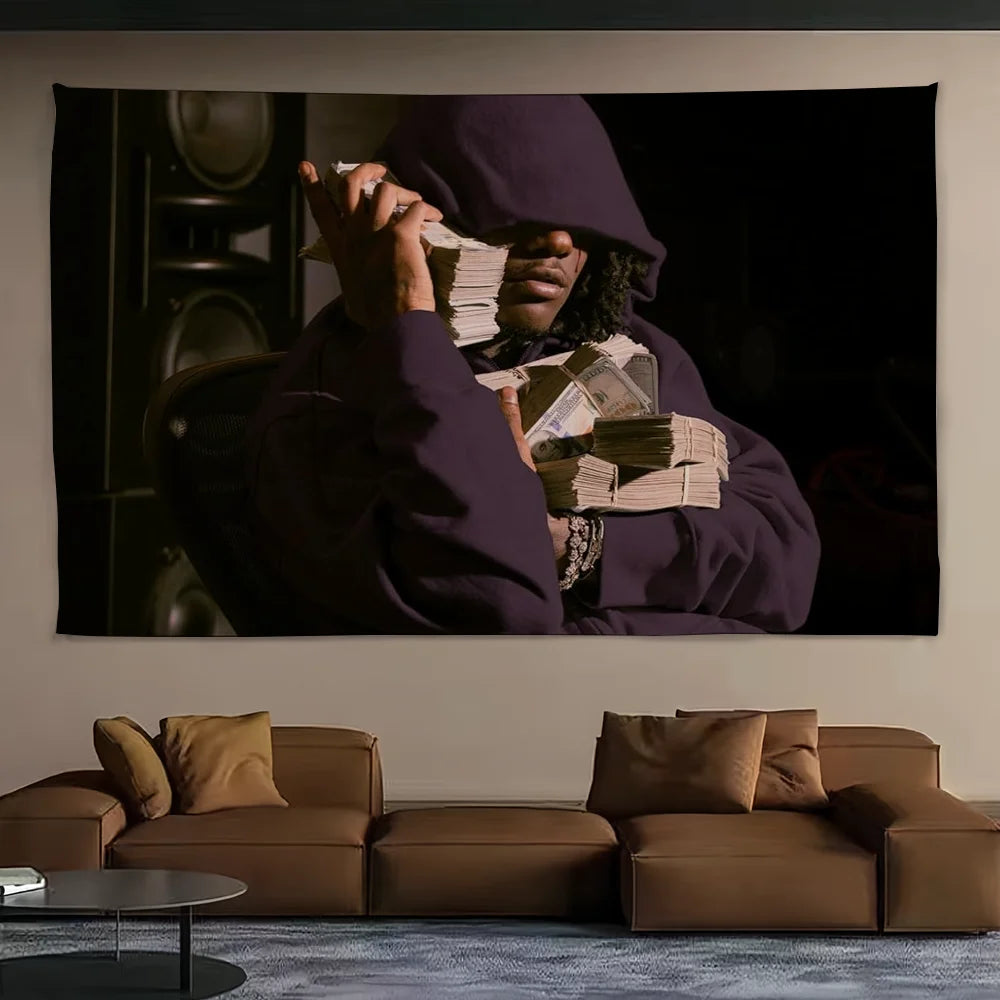 A dark portrait of a person wearing a purple hood looking intensely, displayed on a wall.