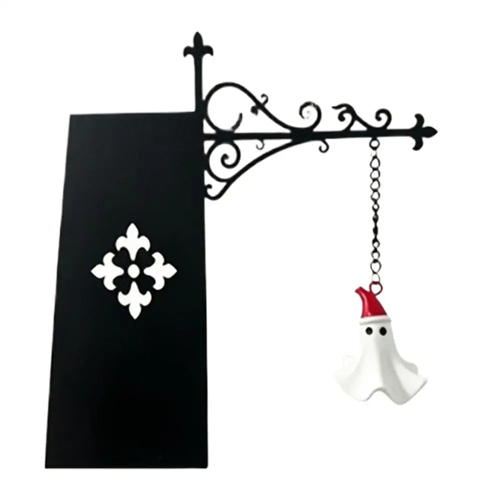 Black wrought iron book nook decor lamp featuring a white ghost figure.