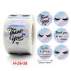 Roll of gold foil thank you sealing stickers with a face design for gifts and packaging
