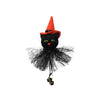 A black cat head with green eyes and orange pointed hat, featuring black feathery wings.