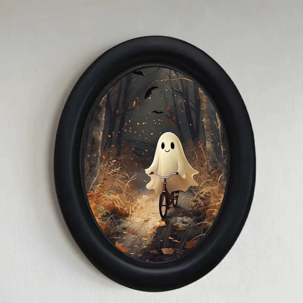 Oval wall art featuring a ghost riding a bicycle in a dark forest scene framed in black