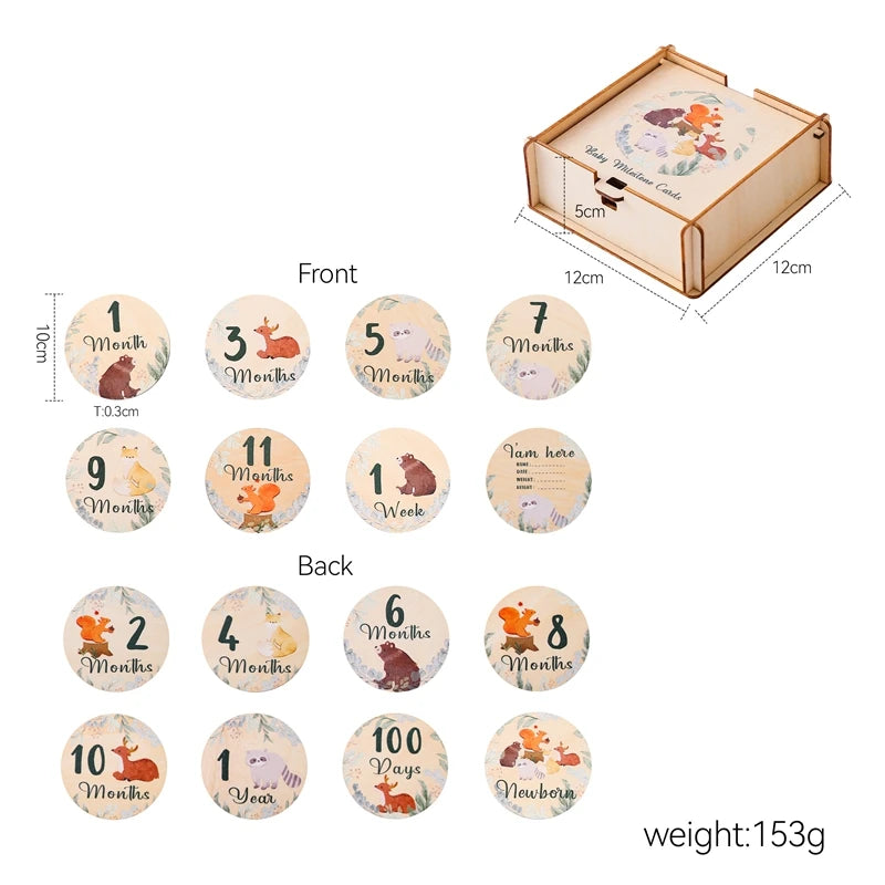 A set of wooden baby milestone cards with a keepsake box showing various months and years.