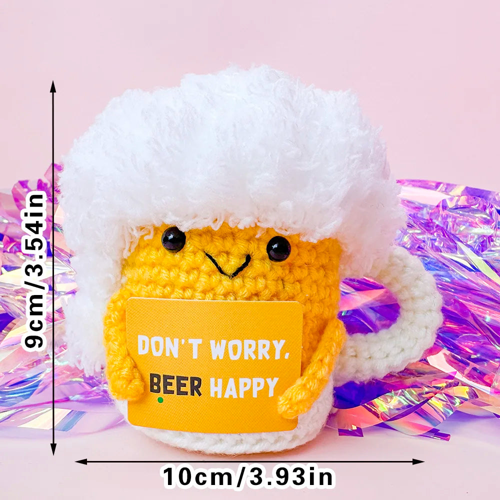 Handmade crochet potato doll with a white fluffy hat and an inspirational card