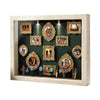 A wooden frame displaying various framed photos in a museum-style display with internal lighting.