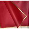 A sheet of deep red satin fabric with a gold edge, shown at an angle.