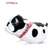 A white and black cartoon cow foil balloon shaped like a farm animal for party decor.