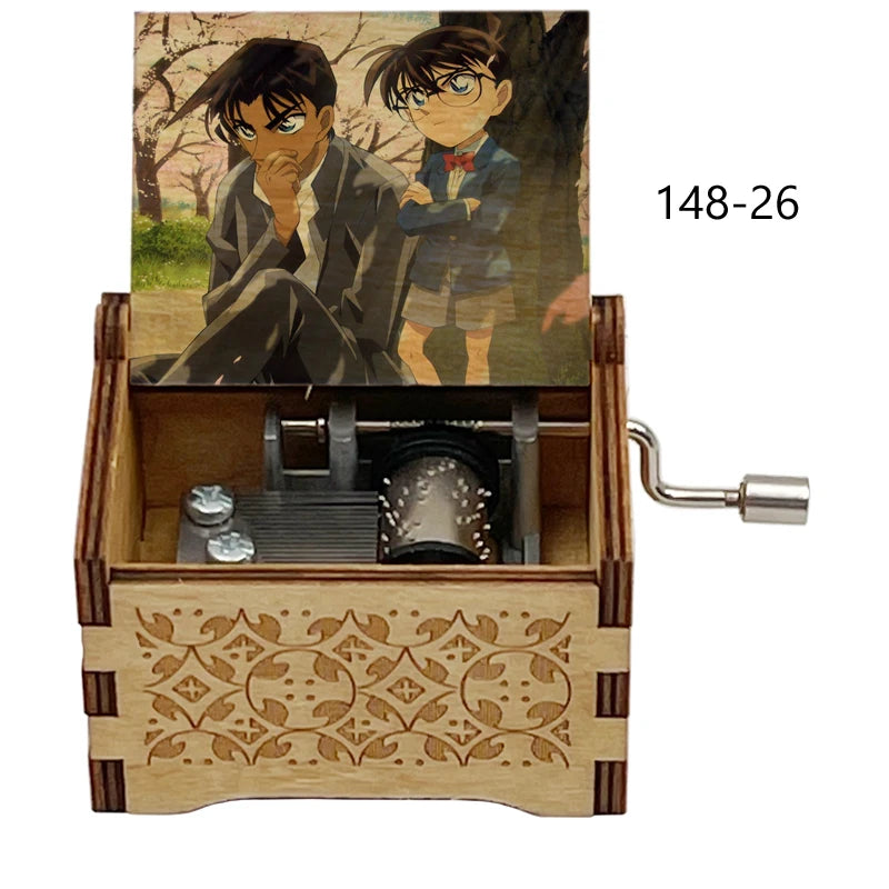 A wooden music box featuring an anime scene of two characters and a mechanism inside.