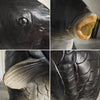 Close-up shots of a funny fish head latex costume mask showing the eye, mouth, and textured scales.