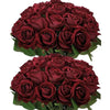 A dense bouquet of deep red artificial silk roses.