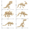 A collection of 3D printed dinosaur skeletons in various poses and sizes displayed against a white background.
