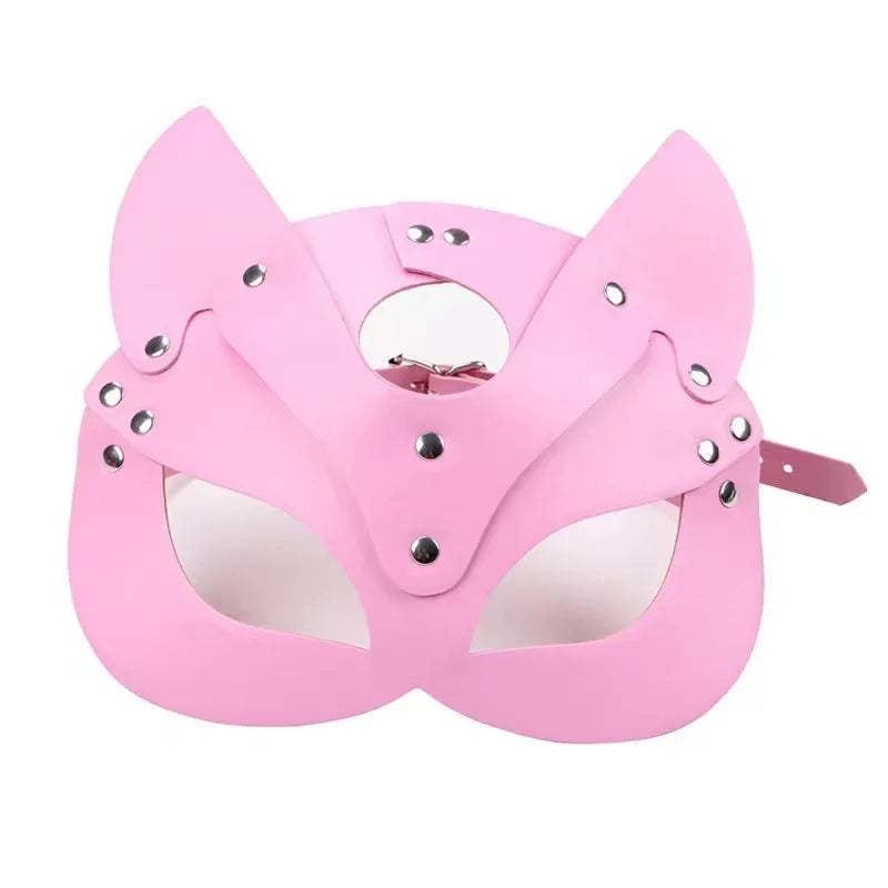 A pink elegant fox masquerade mask with adjustable straps.