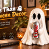 A white ghost figurine holding an aluminum soda can, used as Halloween decor.