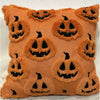 An orange plush pumpkin ghost pillow cover with carved faces for Halloween decor