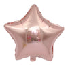A pink foil star and heart balloon assortment.