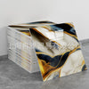 A stack of faux marble 3D self-adhesive wall tiles featuring abstract gold and blue marble patterns.