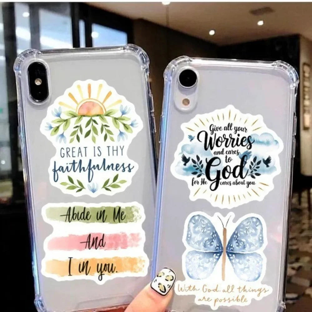 A clear phone case decorated with watercolor graphics featuring a sunrise, leaves, and inspirational phrases about faith and 
