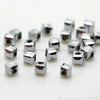 A collection of silver-colored square cut glass crystal beads for jewelry making