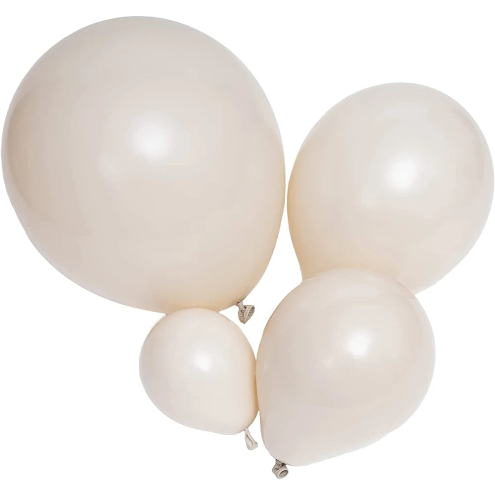 A cluster of elegant sand white latex balloons for weddings and celebrations.