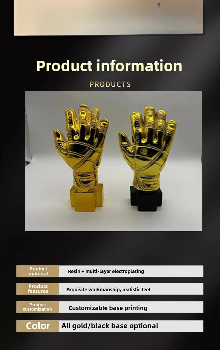 A pair of golden gloves award trophy with a black base, showcasing exquisite workmanship.