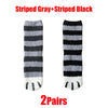 A pair of striped gray and black cat paw print plush socks.