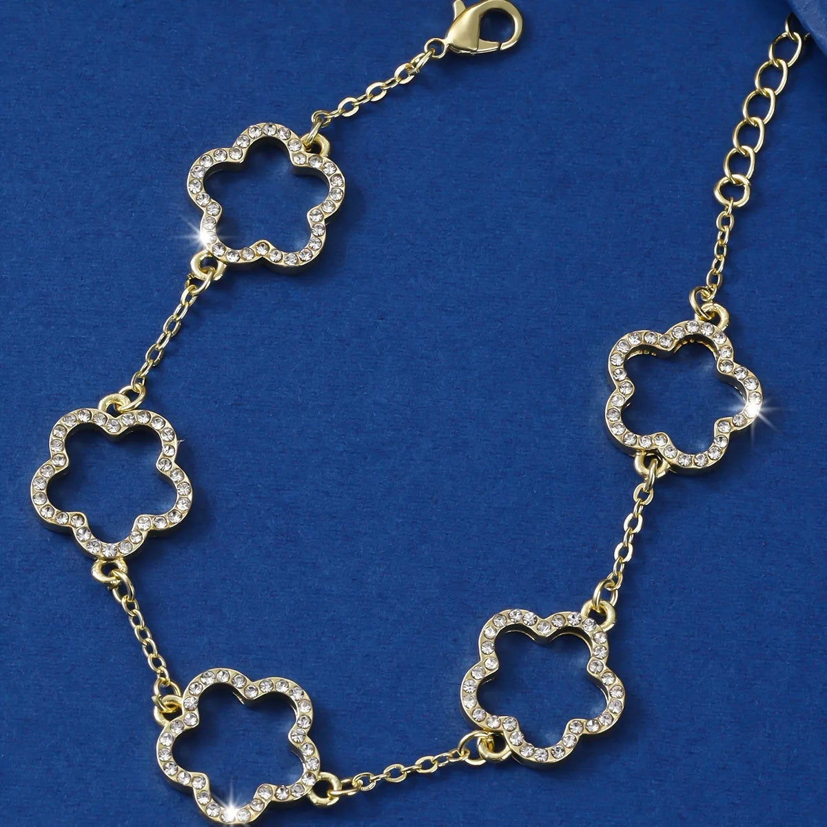 Gold-plated cubic zirconia flower bracelet for women with a delicate chain design