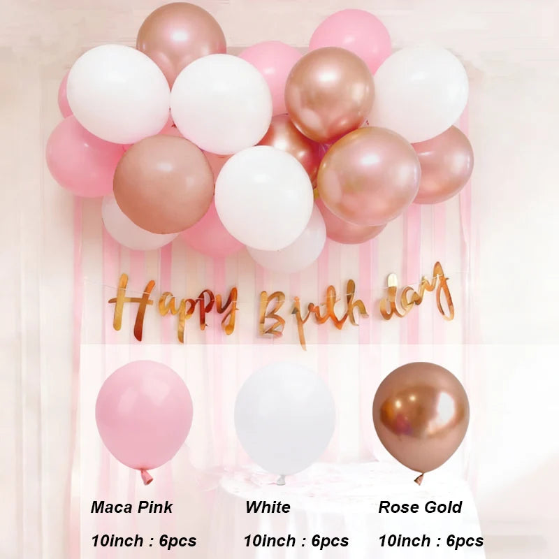 A pink and gold balloon garland featuring white, pink, and rose gold balloons for a birthday celebration.