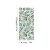 Botanical print static cling window film featuring green and pink leaves on a light background