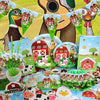 A collection of farm ranch birthday party decorations including a guitar backdrop, tableware, and various themed items.