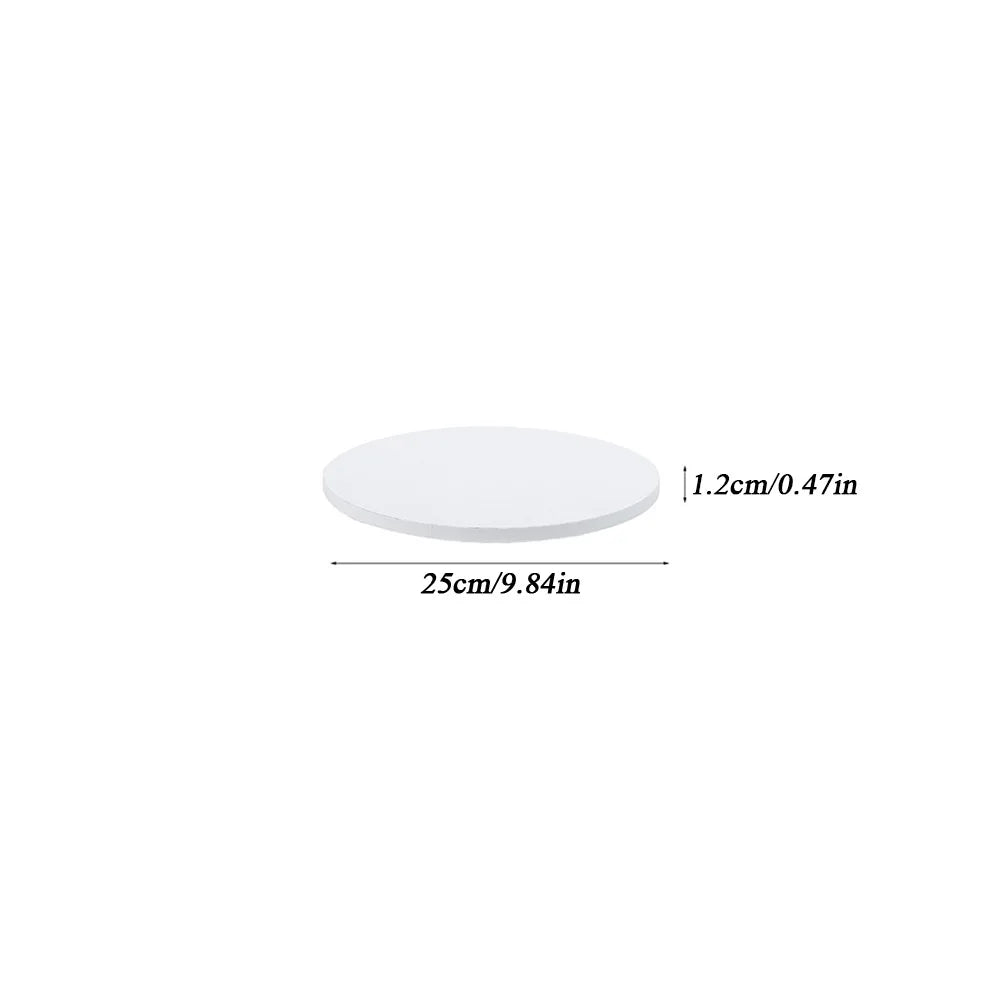 A round white corrugated cake board with a diameter of 25cm or 9.84in and a thickness of 1.2cm or 0.47in.