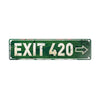 A weathered green metal sign with the text EXIT 420 and an arrow pointing to the right.