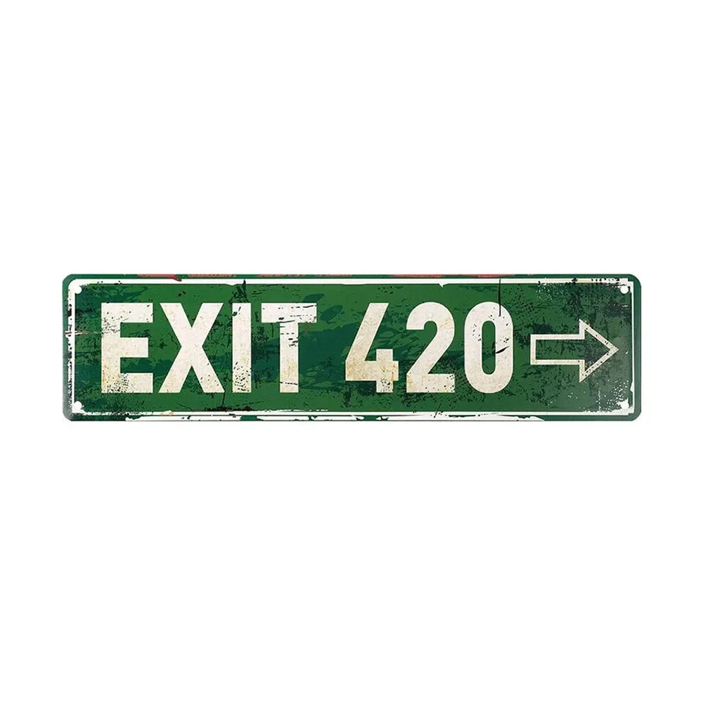 A weathered green metal sign with the text EXIT 420 and an arrow pointing to the right.