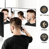 A man is using a portable trifold vanity mirror with an adjustable hook for grooming.