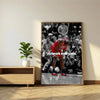 A framed canvas print featuring a basketball player in red and black uniform surrounded by cheering spectators.