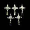 A collection of six silver crucifix pendants featuring enamel finishes and various designs.