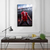 A canvas wall art poster featuring Cristiano Ronaldo in a red jersey, looking determined on a football field.