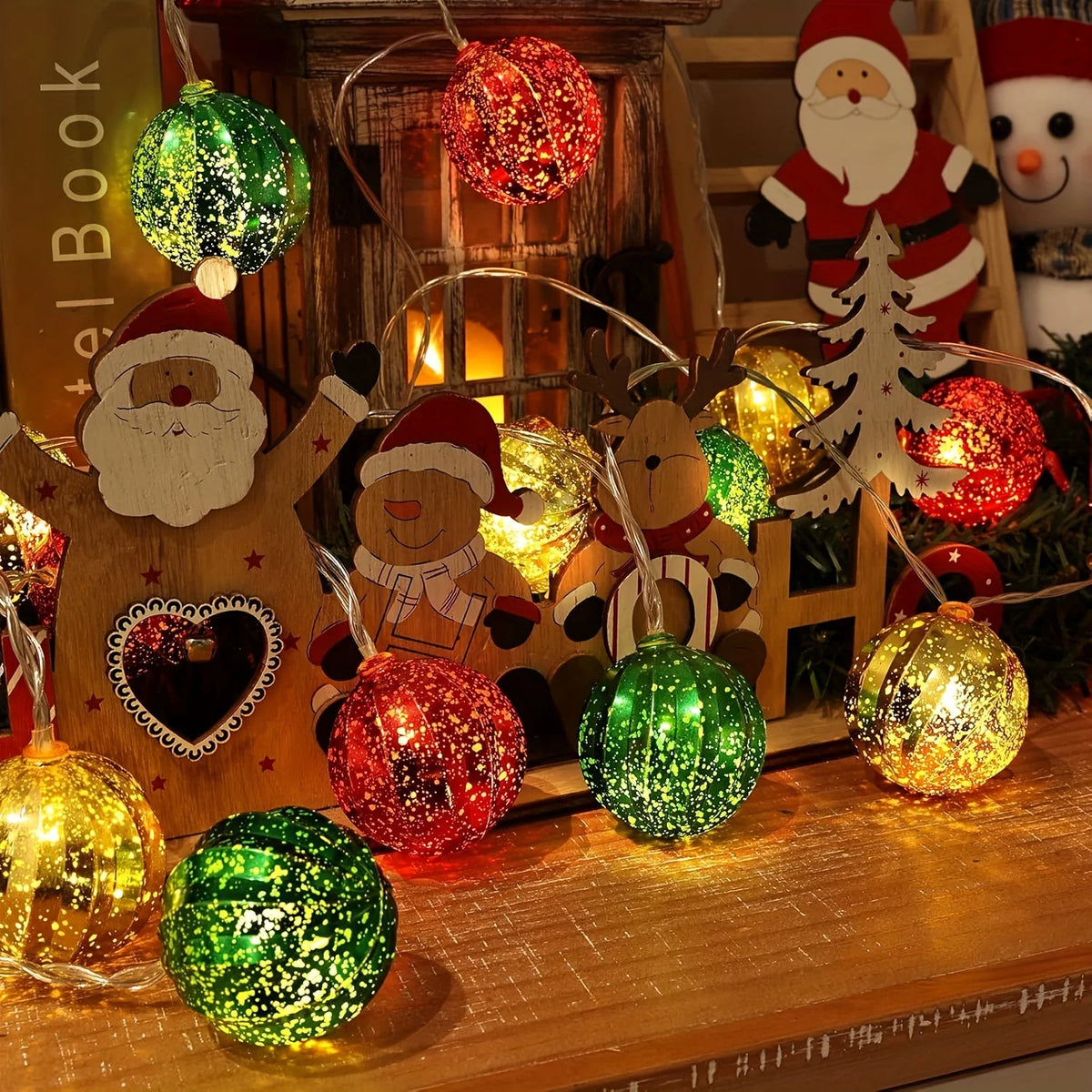 Festive LED fairy lights and ornaments decorated with Christmas themes like Santa and reindeer