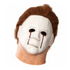 A white latex mask resembling Michael Myers with a bloody scar detail, shown from the front.