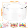 Clear acrylic cake stand with a removable base and decorative filler for dessert display