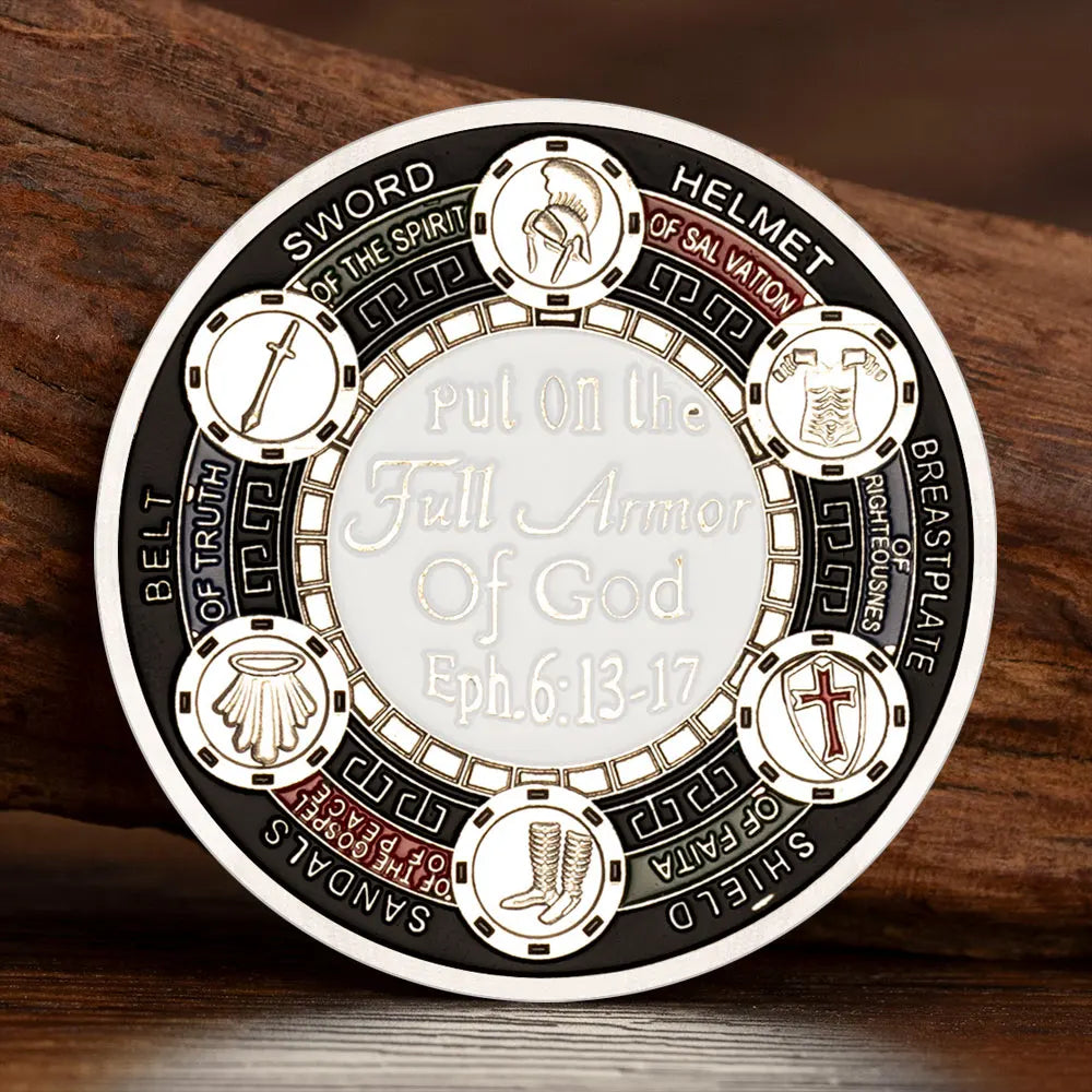 A round commemorative coin featuring various pieces of the Armor of God, including a sword, helmet, and shield.