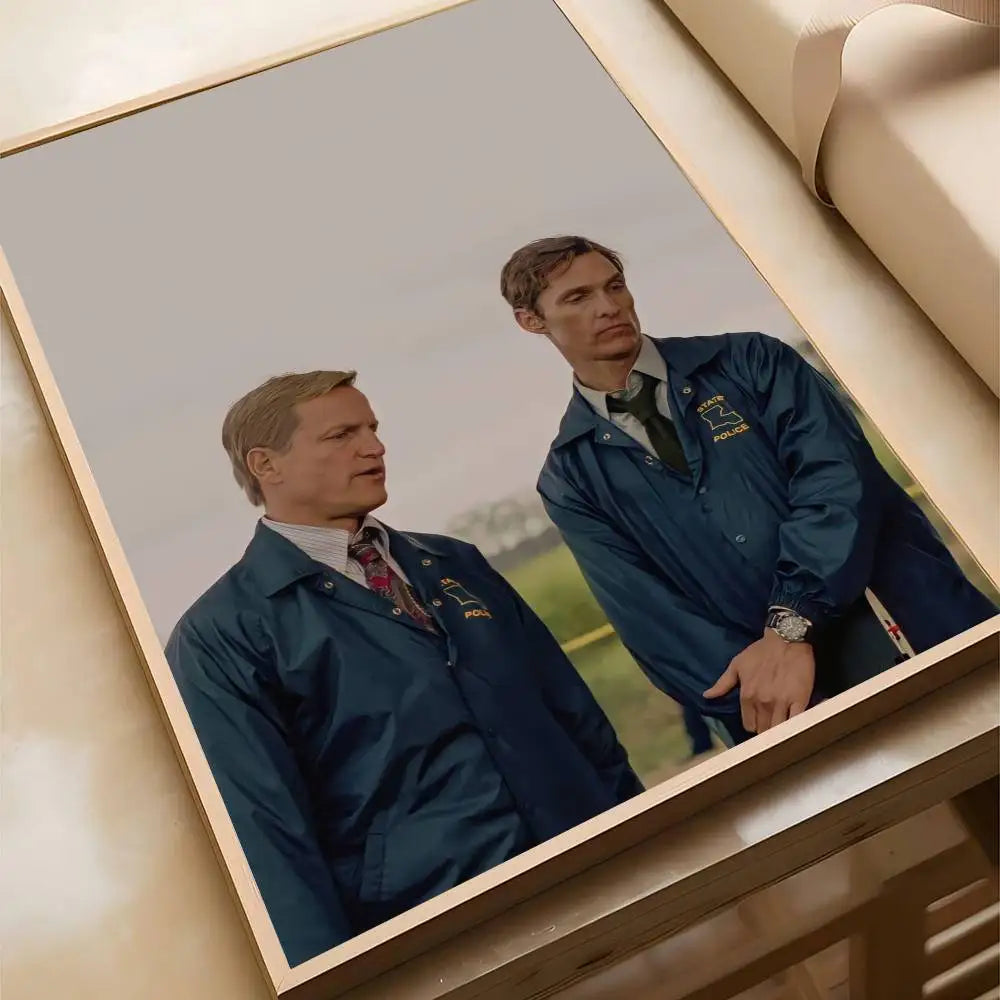 A movie poster featuring a man in a dark blue jacket and tie, displayed in a wooden frame.