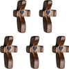 A set of wooden comfort prayer crosses used for anxiety relief.