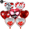 Seven heart-shaped balloons in various colors including red and silver with 'I love you' or 'love' text