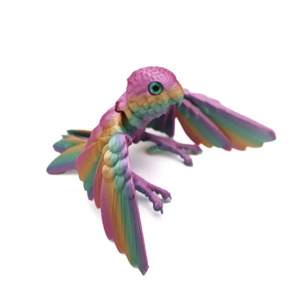 A vibrant purple and green articulated 3D printed parrot figurine with movable wings.