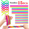 A hand is holding a bundle of colorful, stretchy noodles and another hand is holding a single noodle.