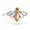 Gold resin animal wall hanging decor shaped like a dragonfly with translucent wings